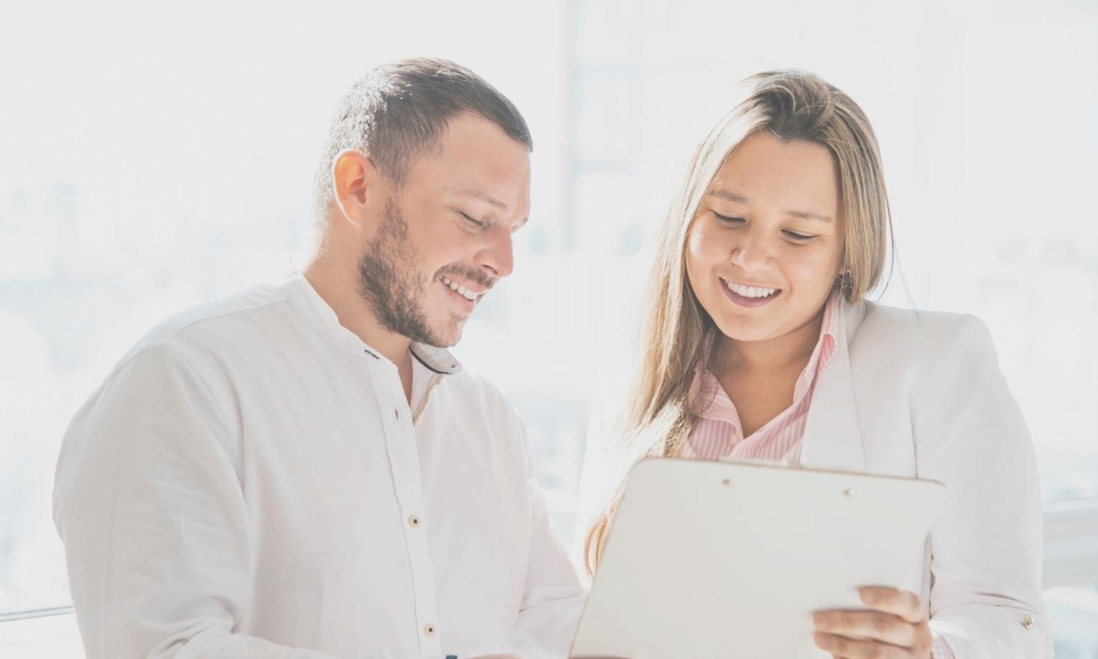 Business owner analyzing financial reports with confidence